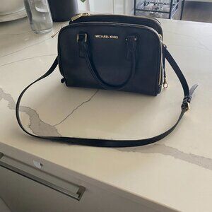Sleek Black and Gold Michael Kors Satchel
